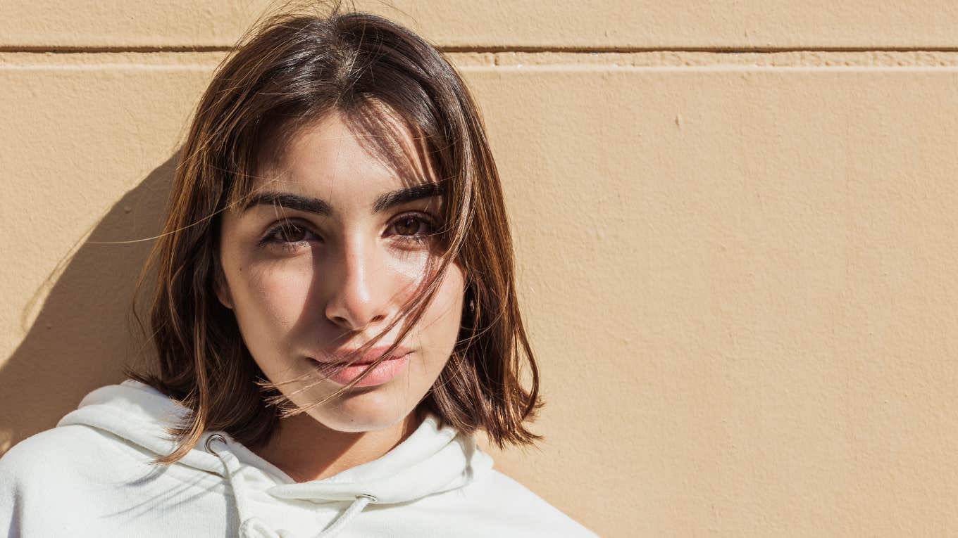 Subtle Ways Universe Warns Someone Bad News Brunette woman warned by universe about someone who is bad news