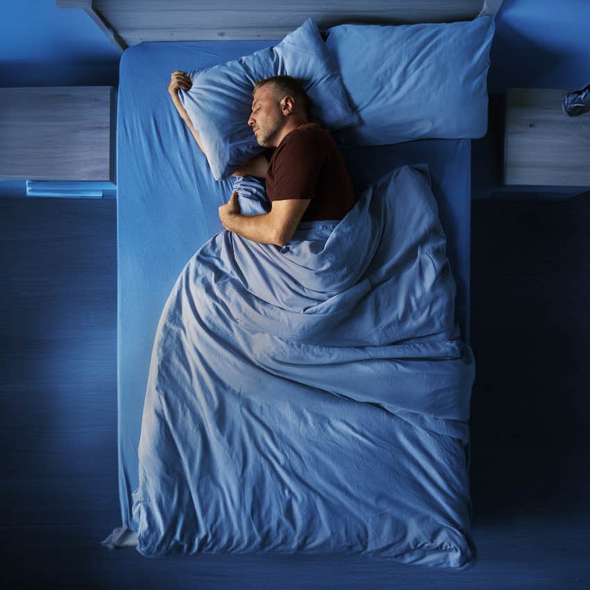 man sleeping and dreaming as universe warns him about someone