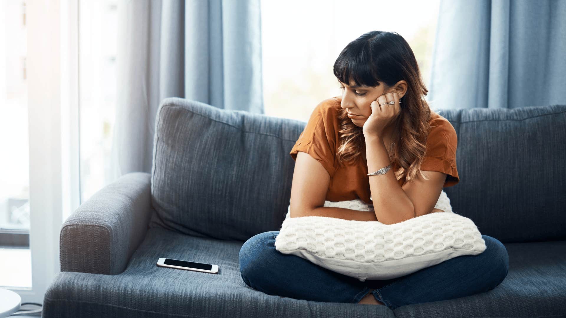 woman whose relationship is incompatible because her partner's support is inconsistent