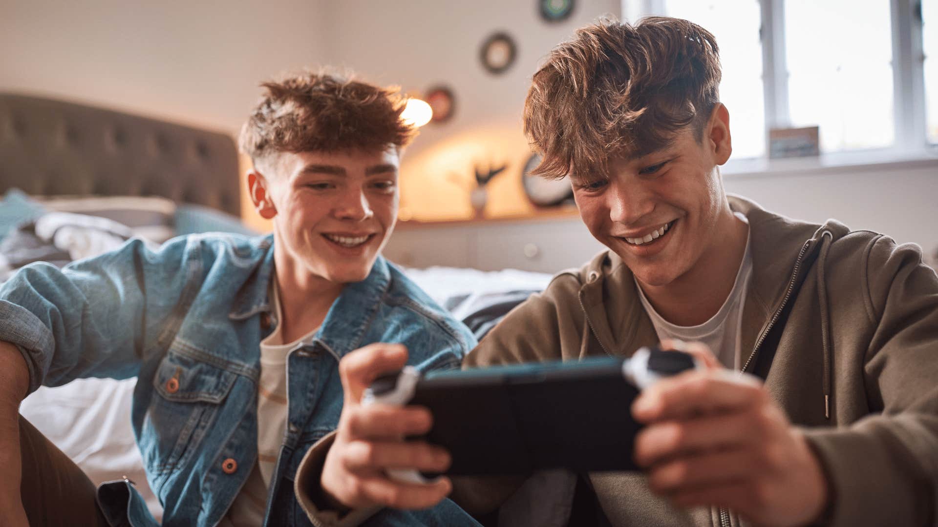 two boys playing video games