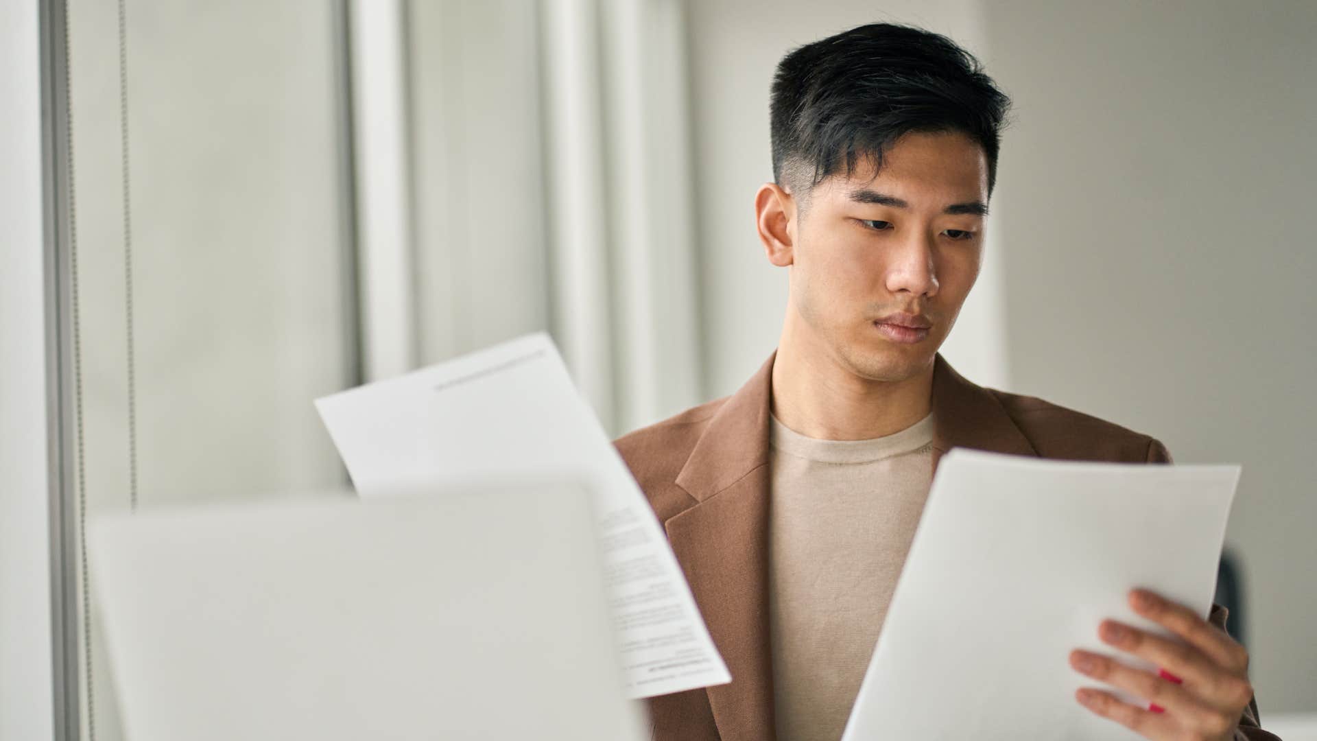 Gen Z man who needs parents' help with his taxes