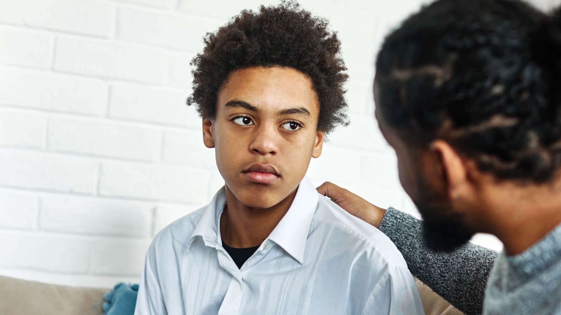A father looks at his son, worrying about him everyday.