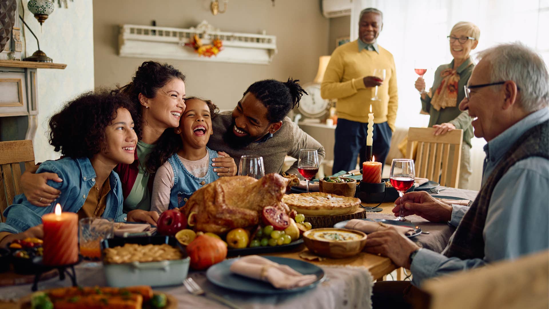 A family celebrating a traditional family dinner.