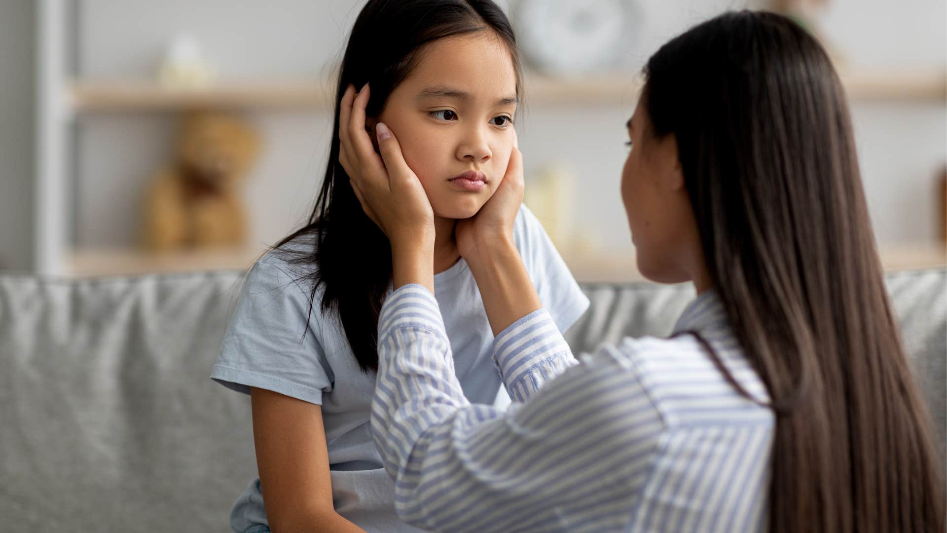 A little girl looks on at her mom not realizing the little sacrifices her mother made.