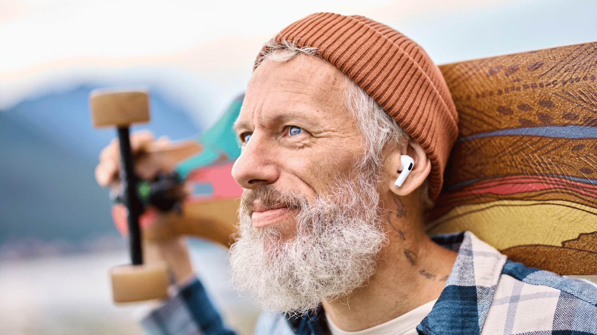 Oldre man with skateboard thinks being a bad boy matters
