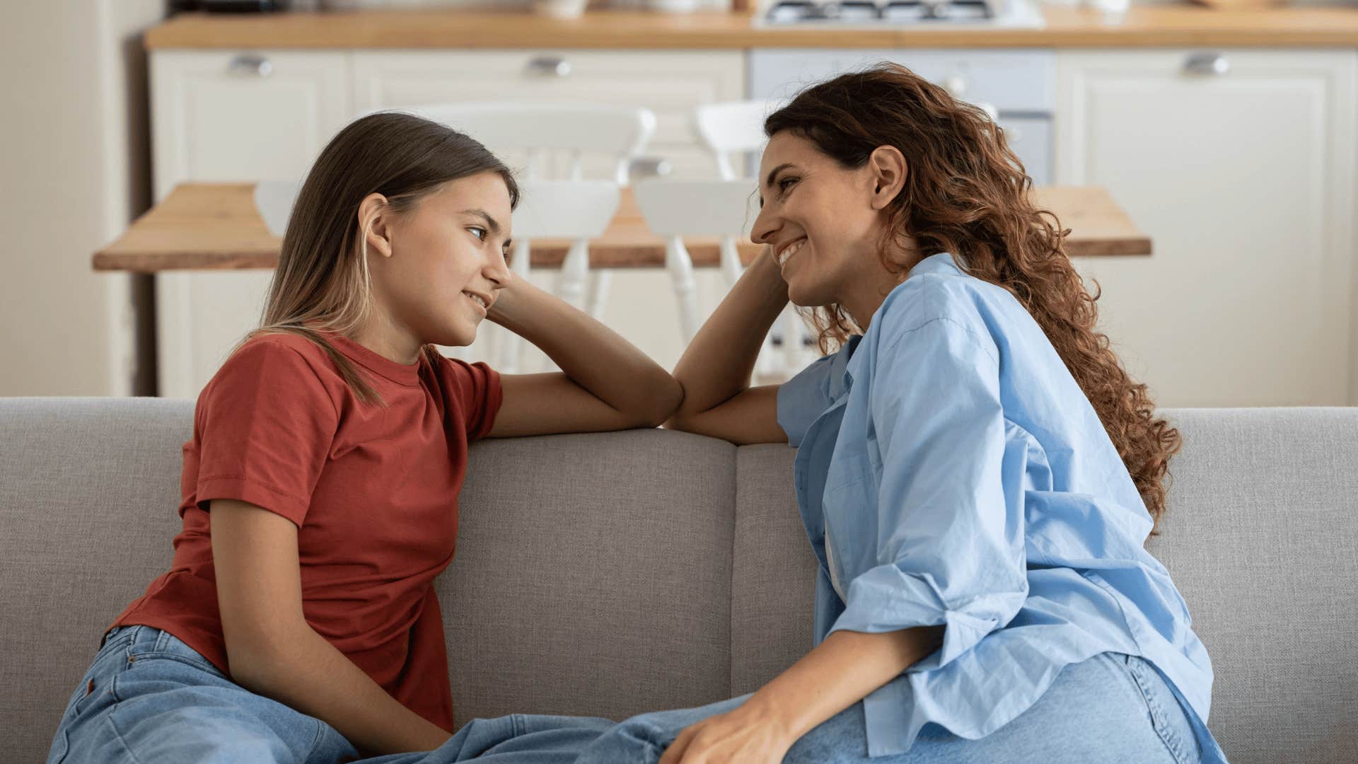 woman talking to teen daughter