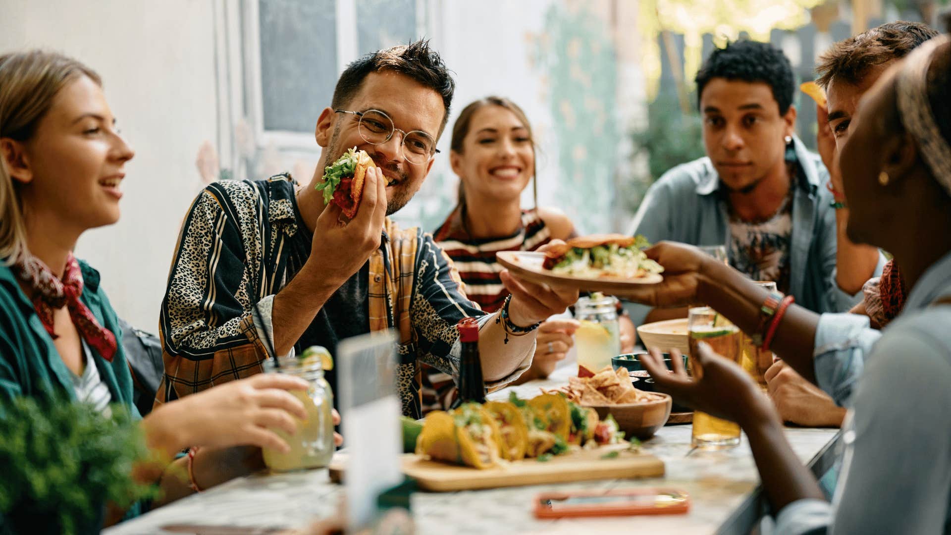 group of millennial friends eating brunch