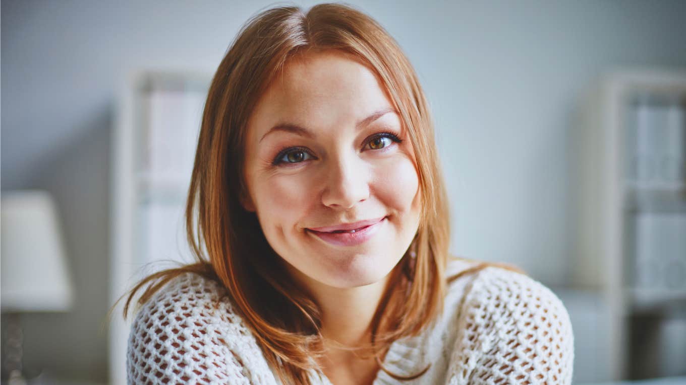 young gen z woman smiling