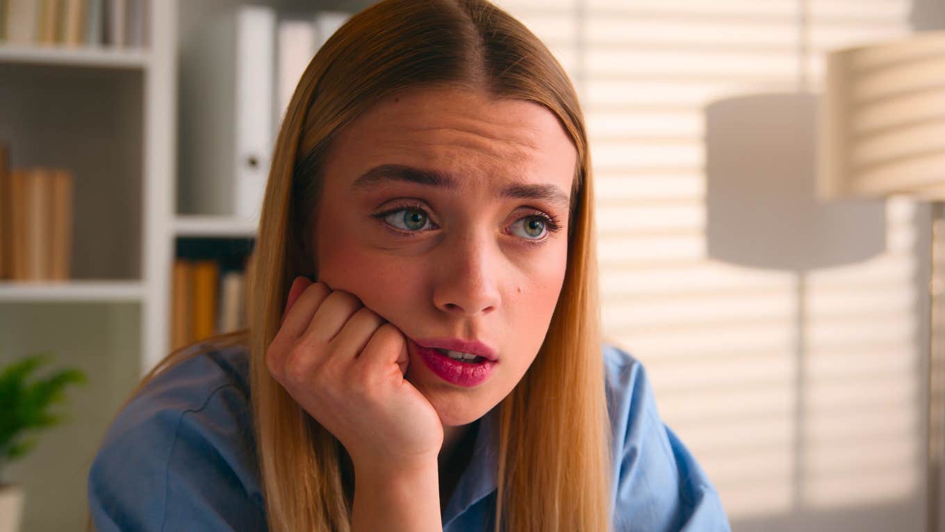 things people pretend to care about at work but absolutely do not woman pretending to care about something at work but she absolutely doesn't