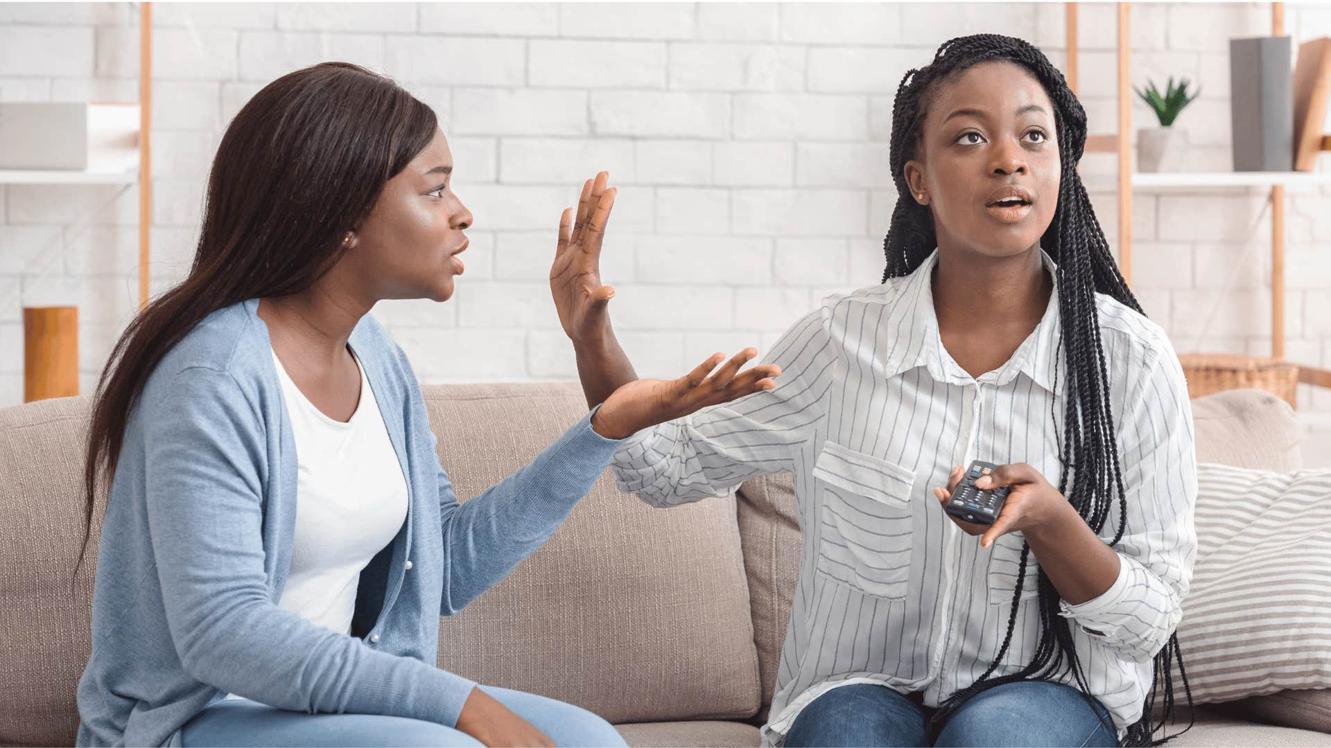 young woman complaining rudely to her friend