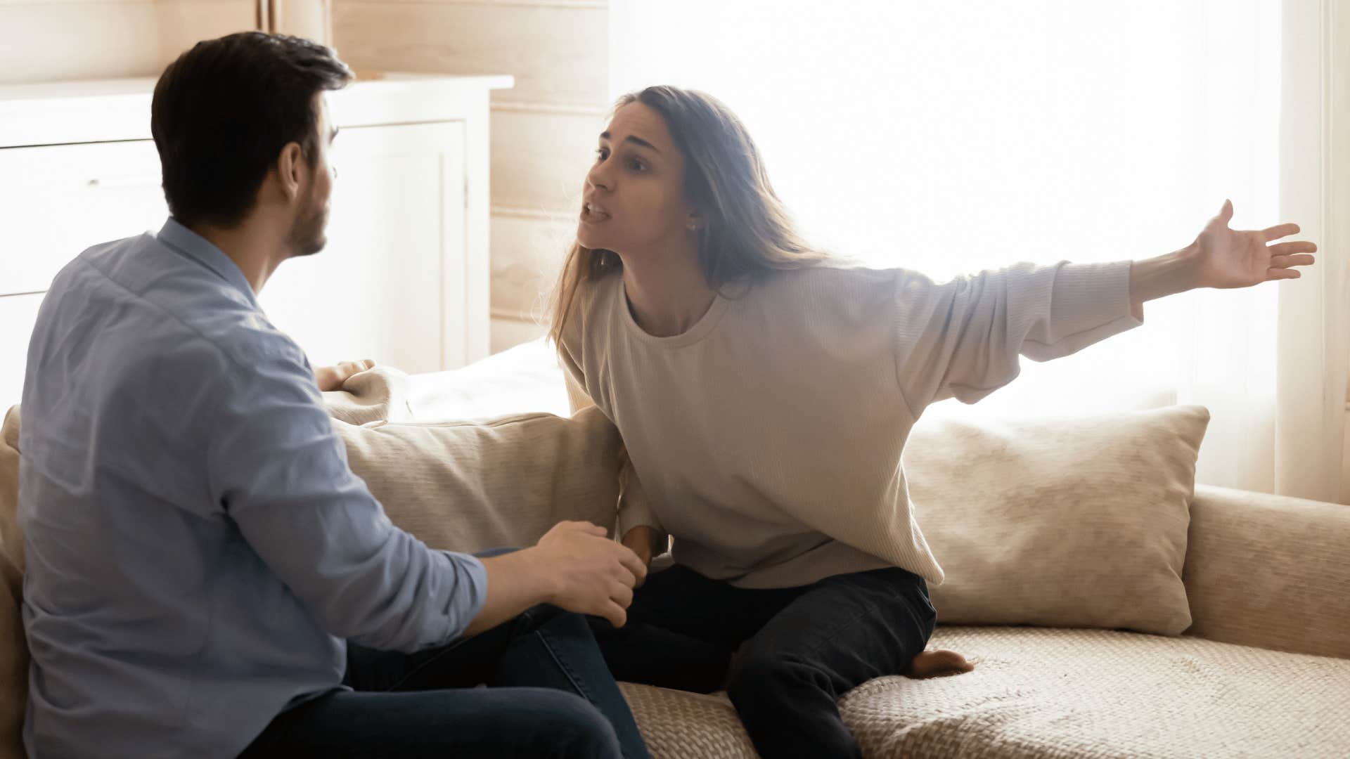 woman blaming someone else for a negative situation because she's hungry