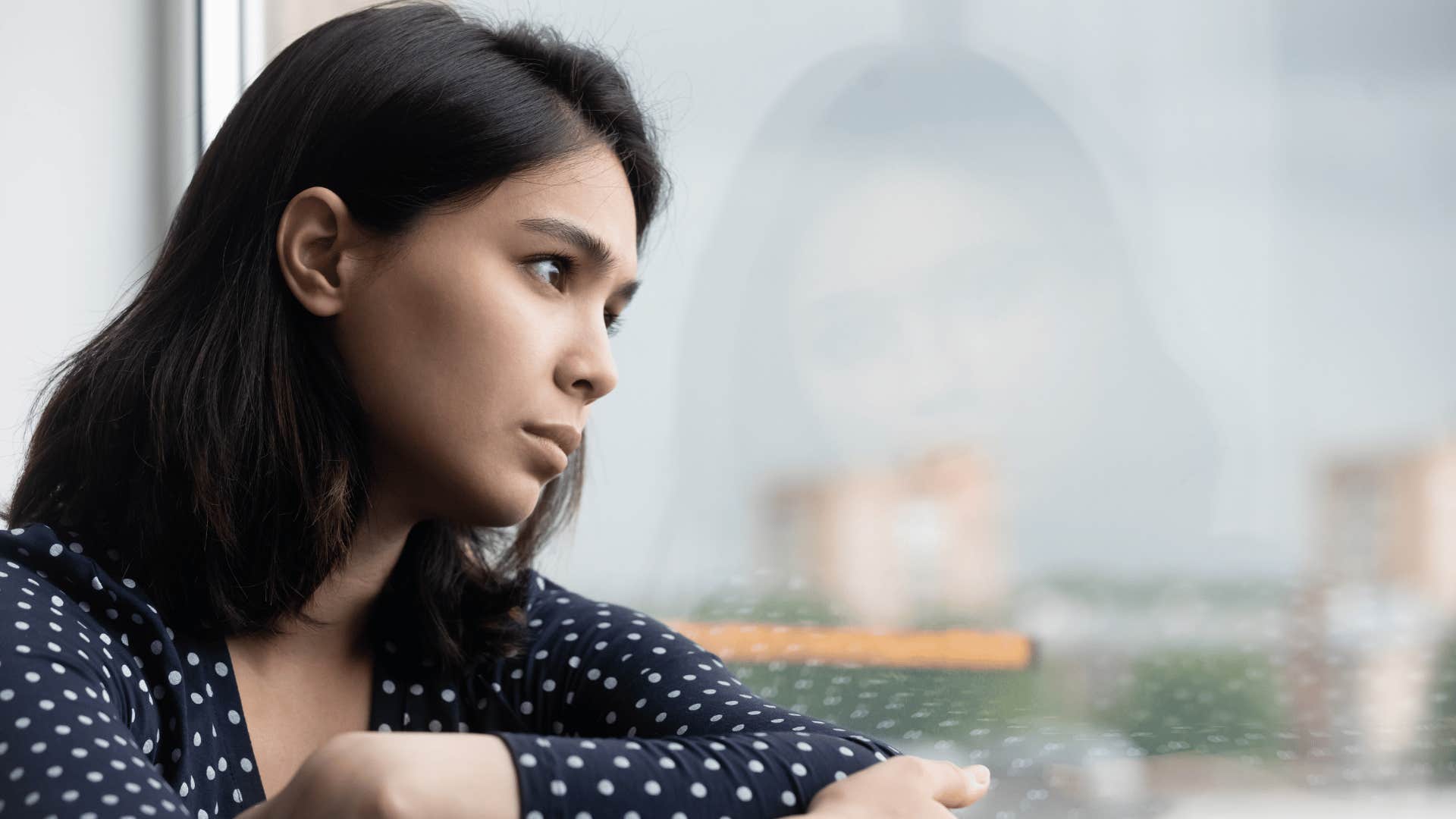 woman feeling negative about an ambiguous situation because she's hungry