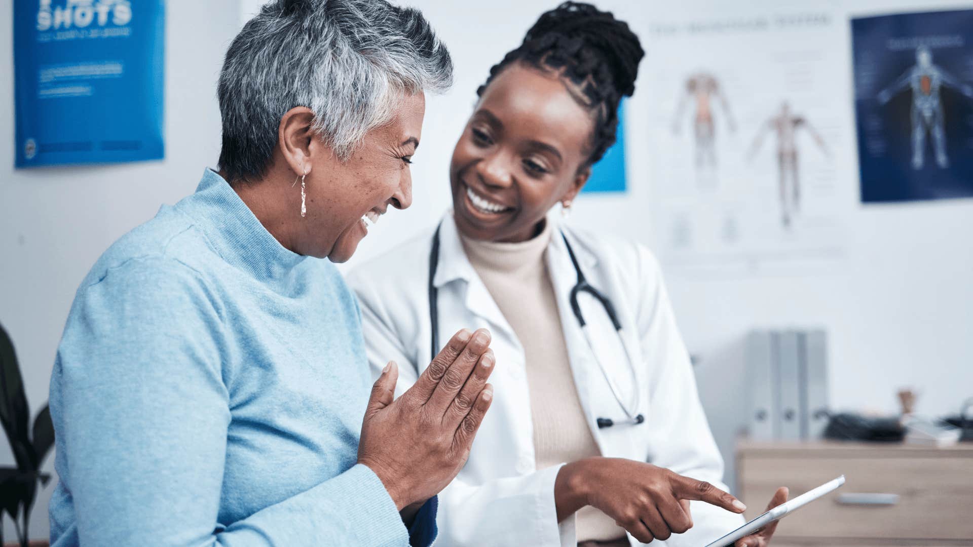 doctor talking to older woman in exam room