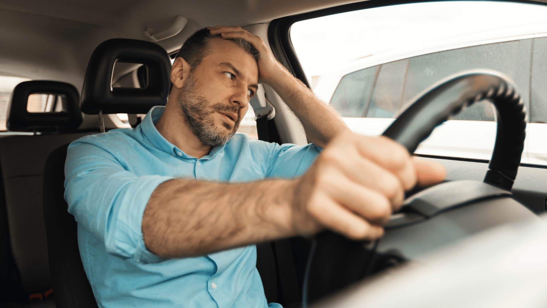 man getting stuck in traffic