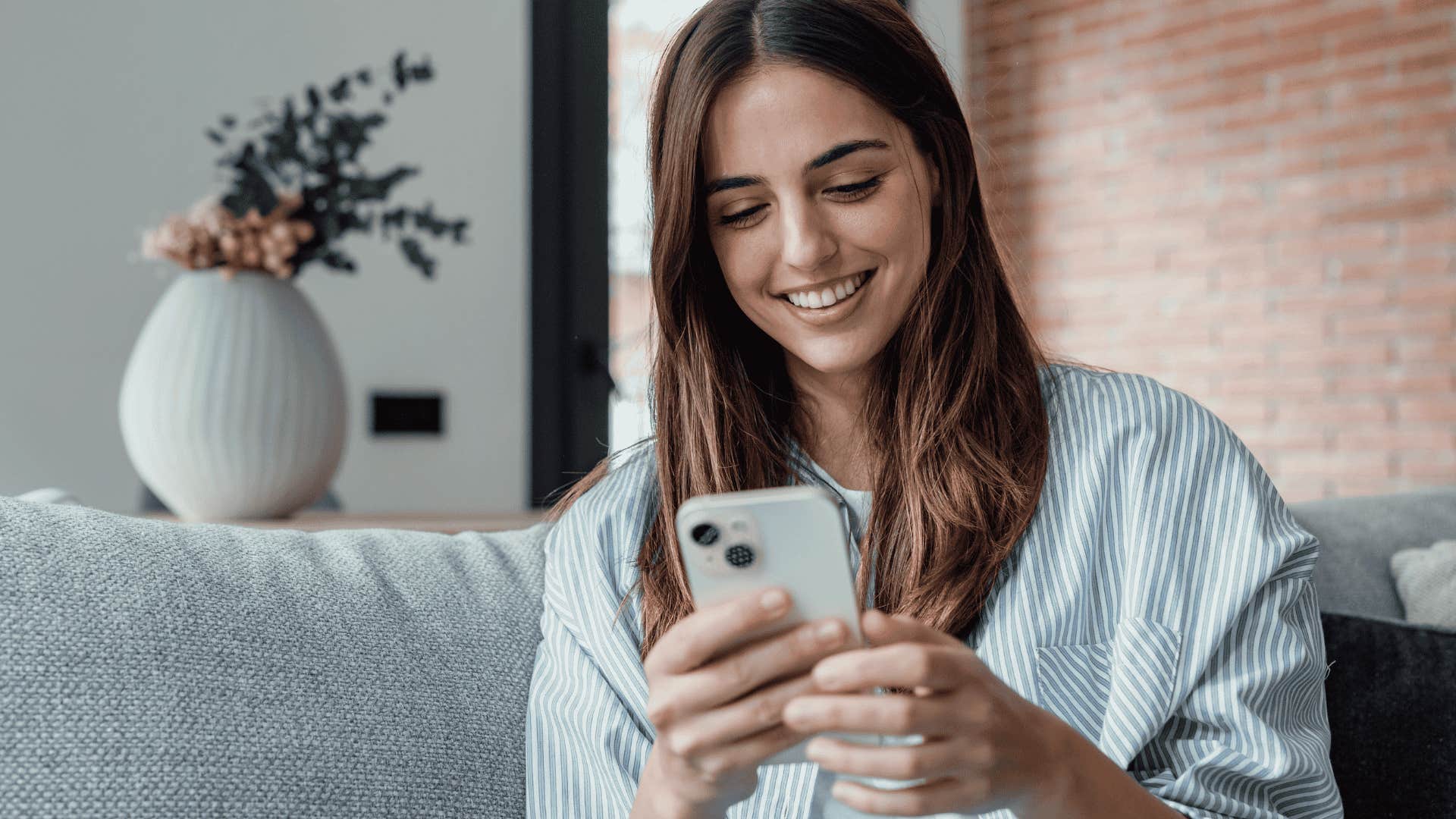 woman texting on her phone