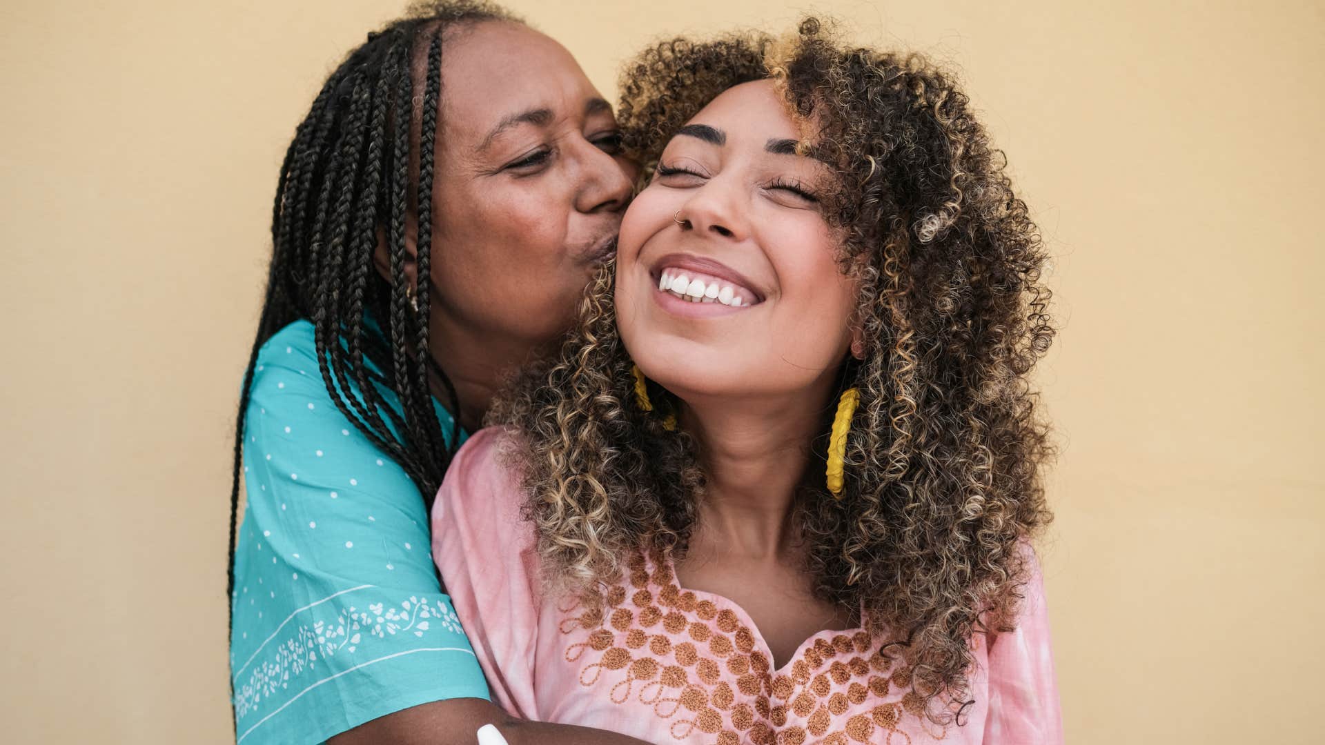 loving mom celebrating her daughter's success
