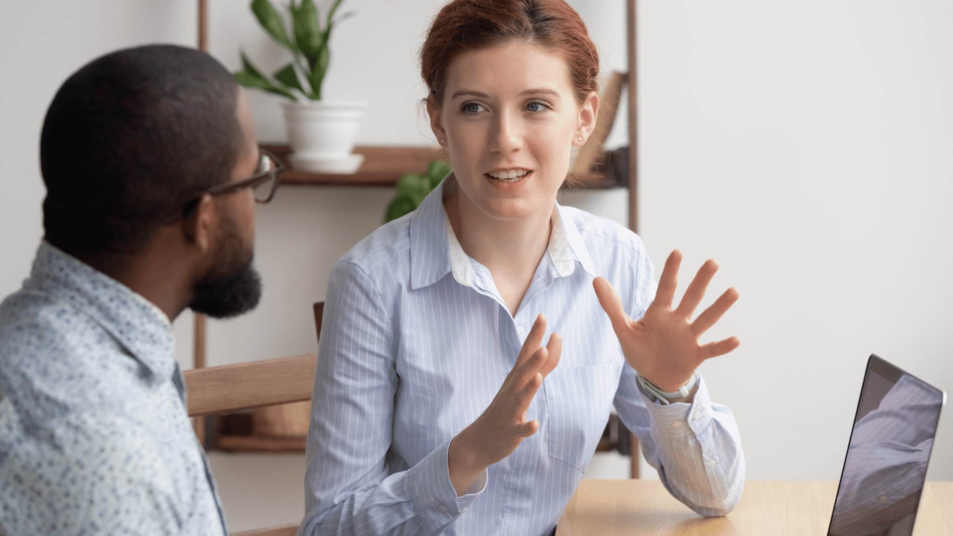 woman over-explaining herself to a man