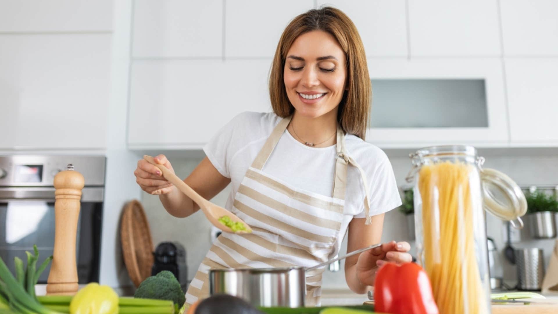 smiling woman cooking