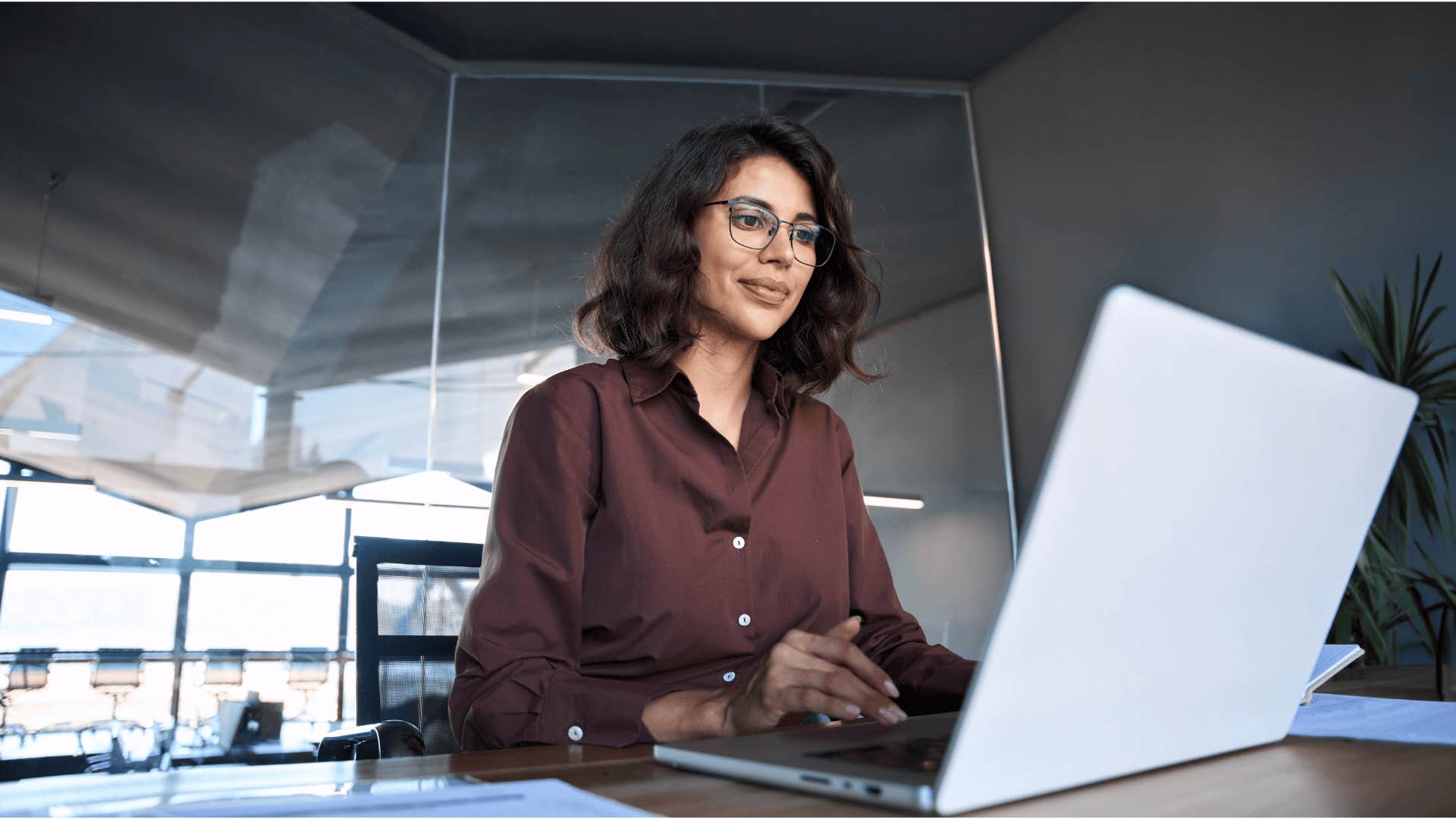 woman working on laptop is book smart