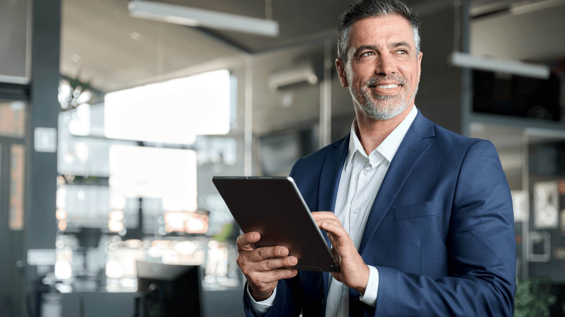 man with a tablet is book smart