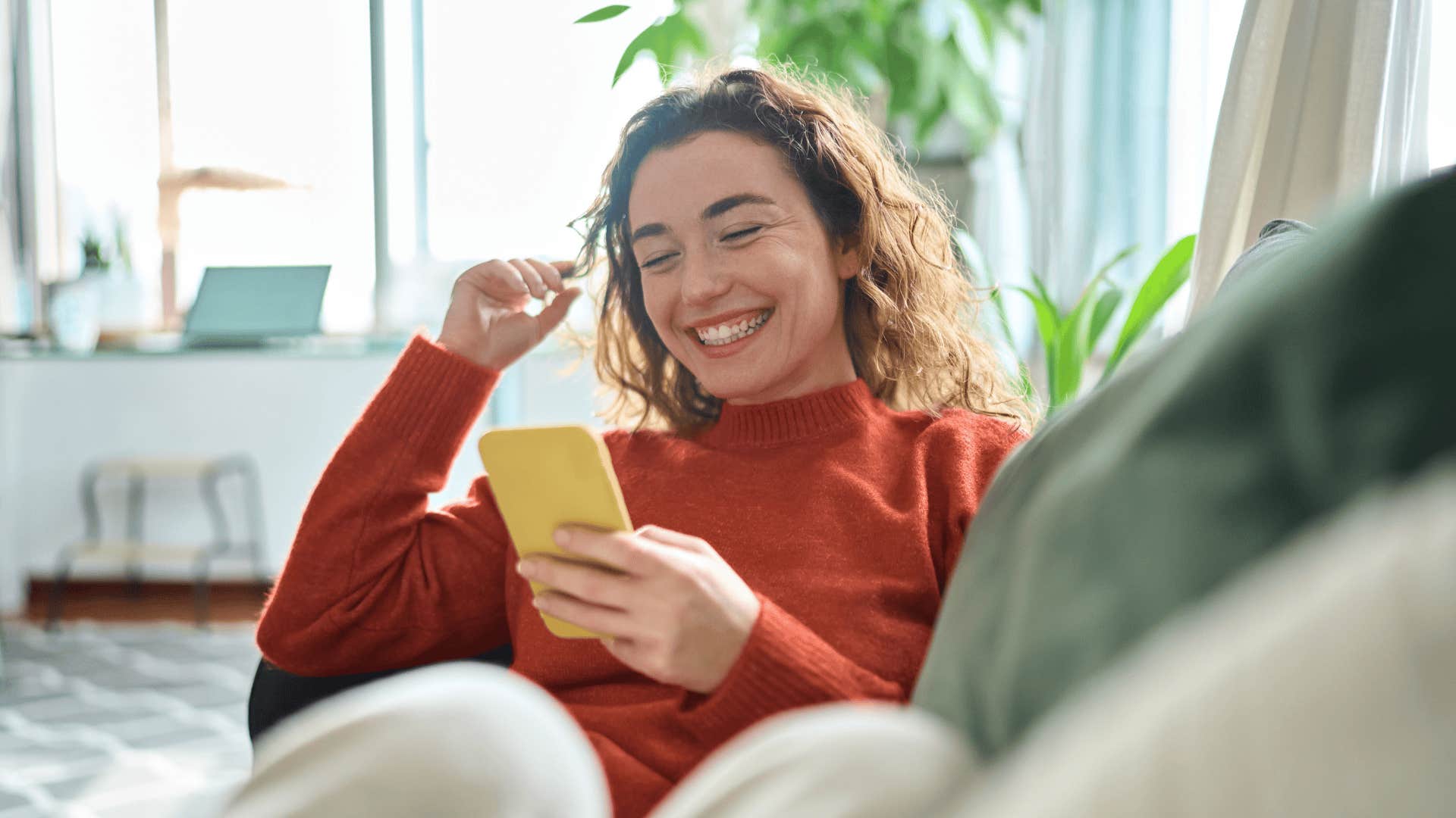 smiling woman on phone is book smart