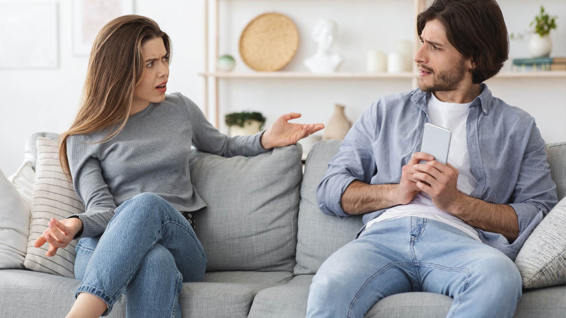 A woman sees her boyfriend as untrustworthy after trying to hide his phone.