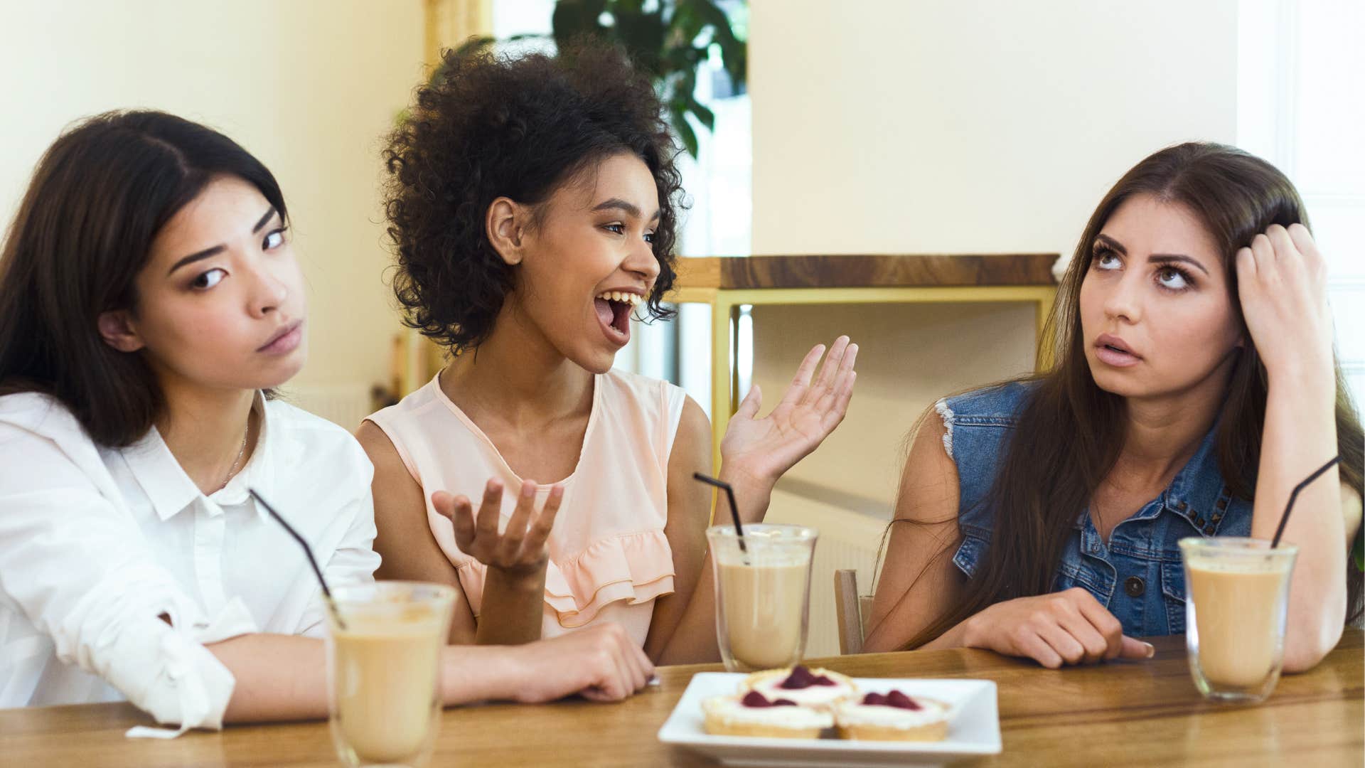 A woman tries to cheer her negative friends up but it’s not working.