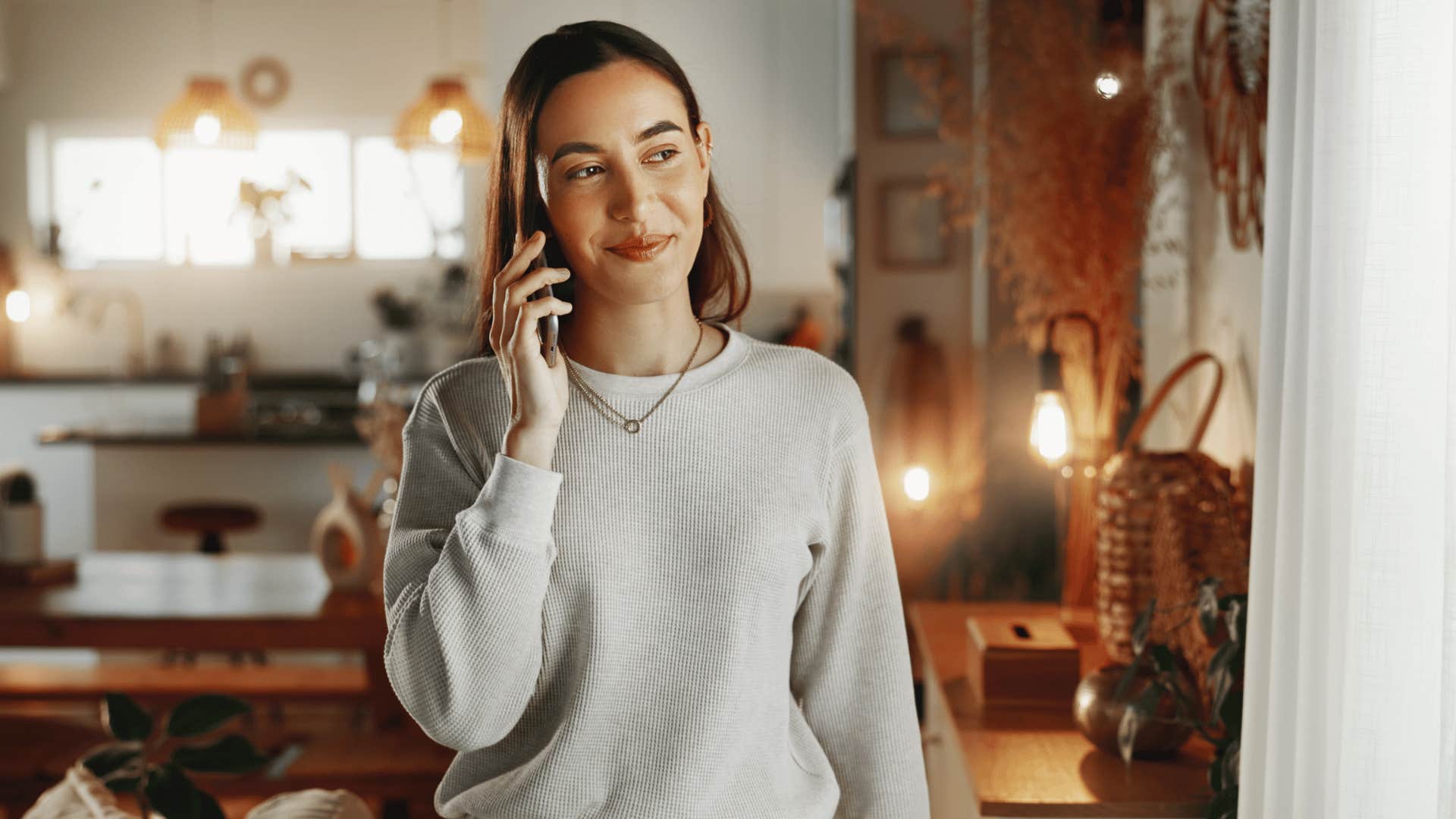 woman talking on phone staying in touch with friends family