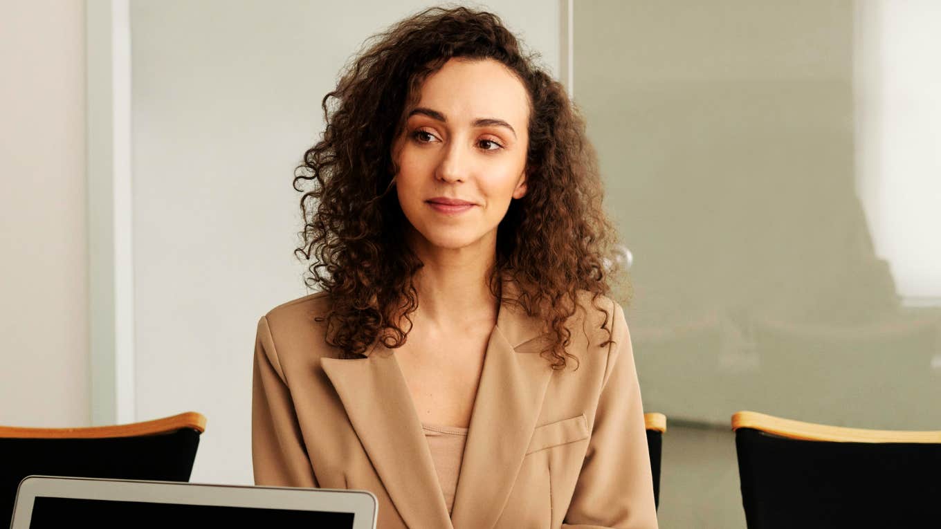 words you should never use in a job interview, according to experts Woman in a job interview.