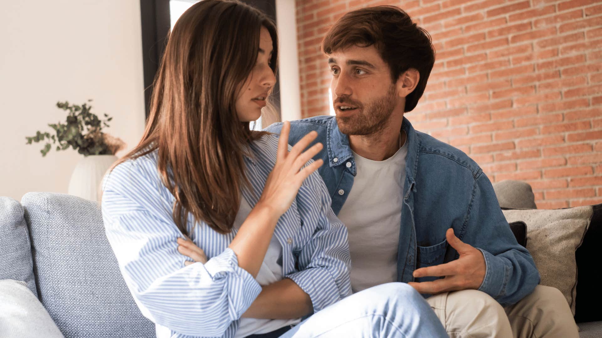woman turning away from her upset husband