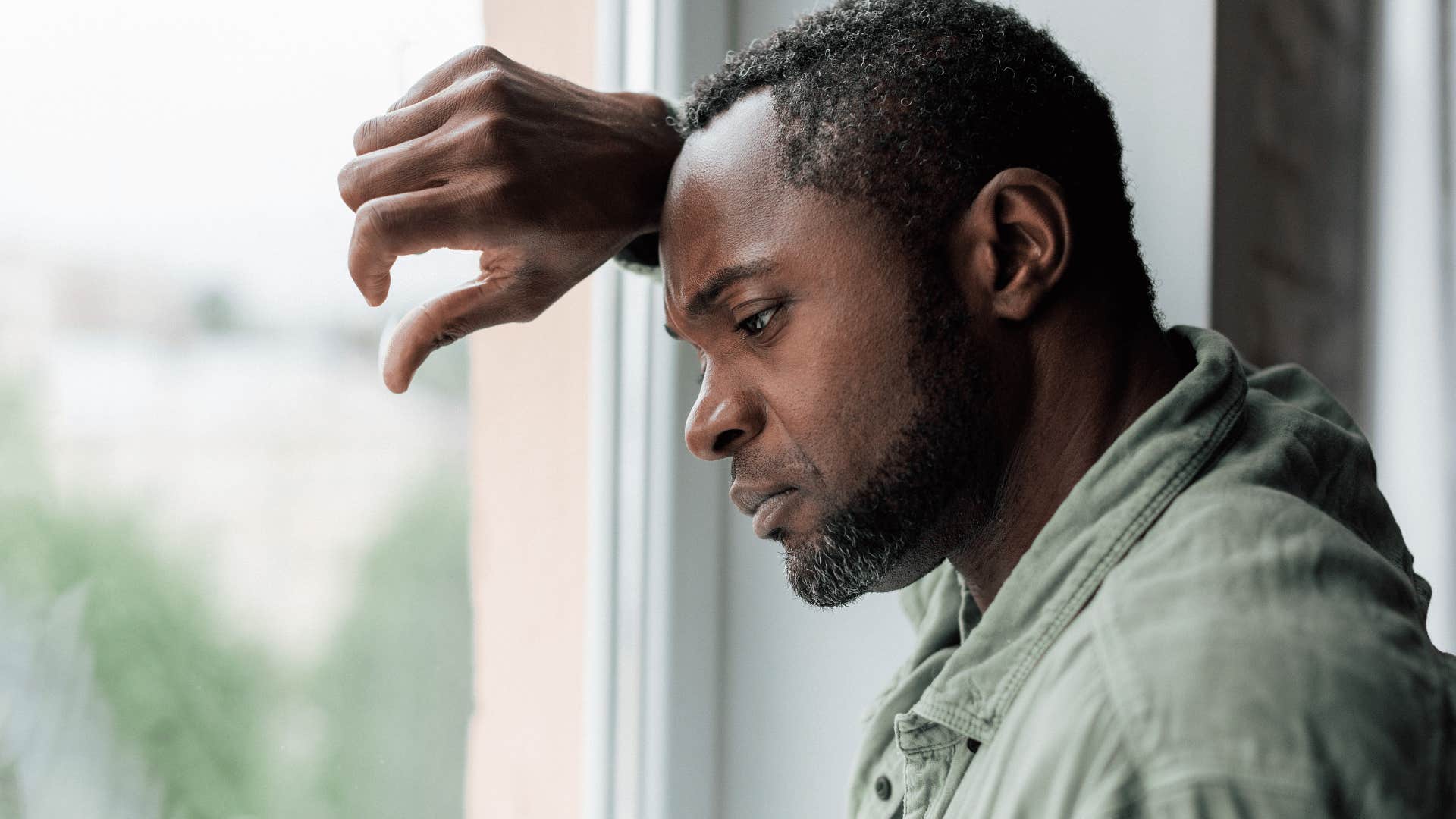 sad man reflecting on his high expectations