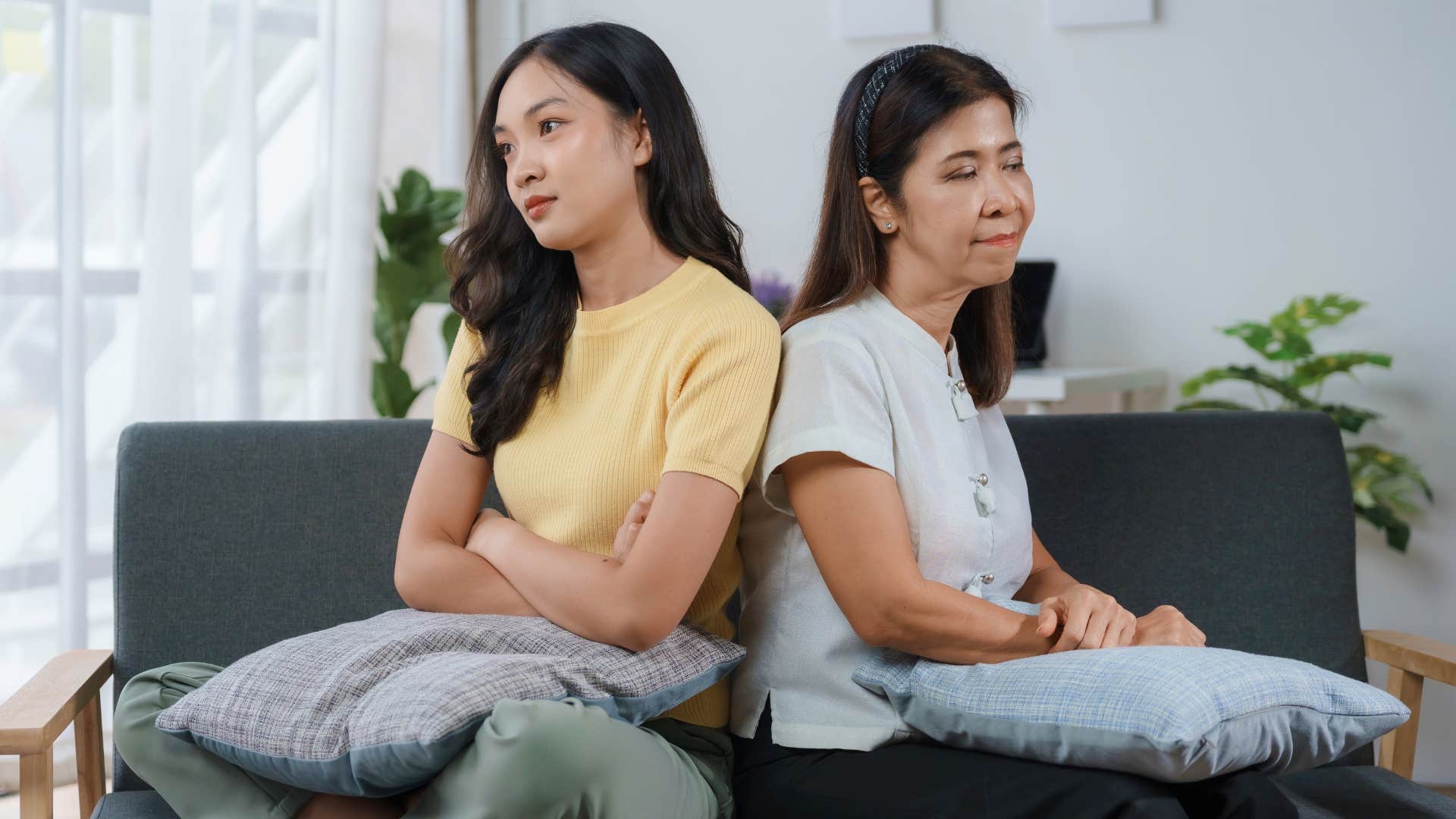 woman turned away from her competitive mom