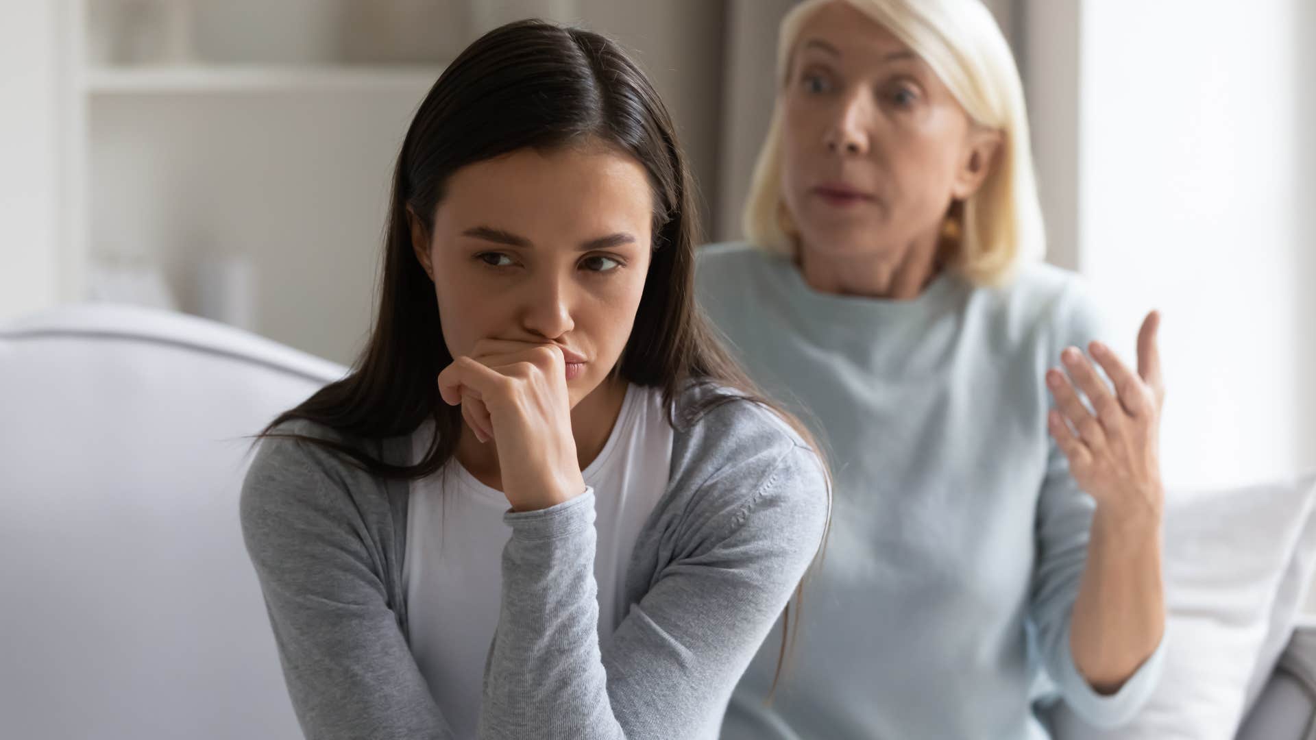 woman turned away from her mom with differing opinions