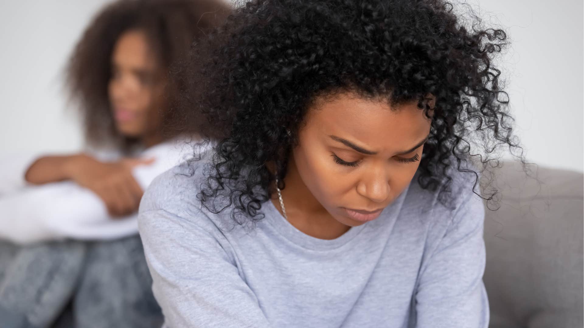woman whose parents feel entitled to her energy looking down