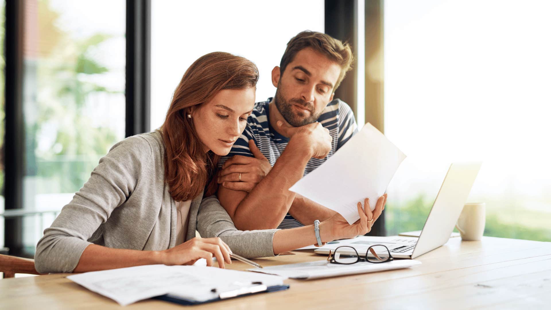 couple stressing about filing fees for taxes