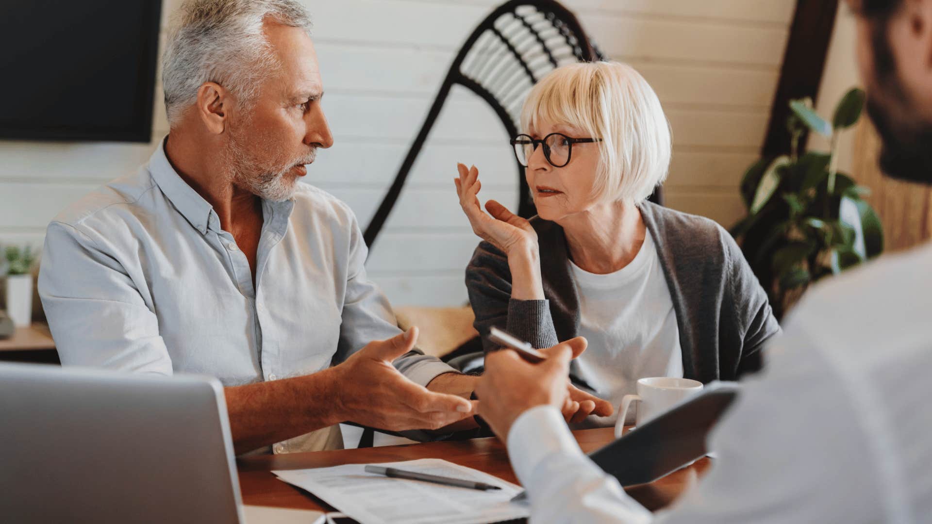 couple arguing about the cost of homeowners insurance