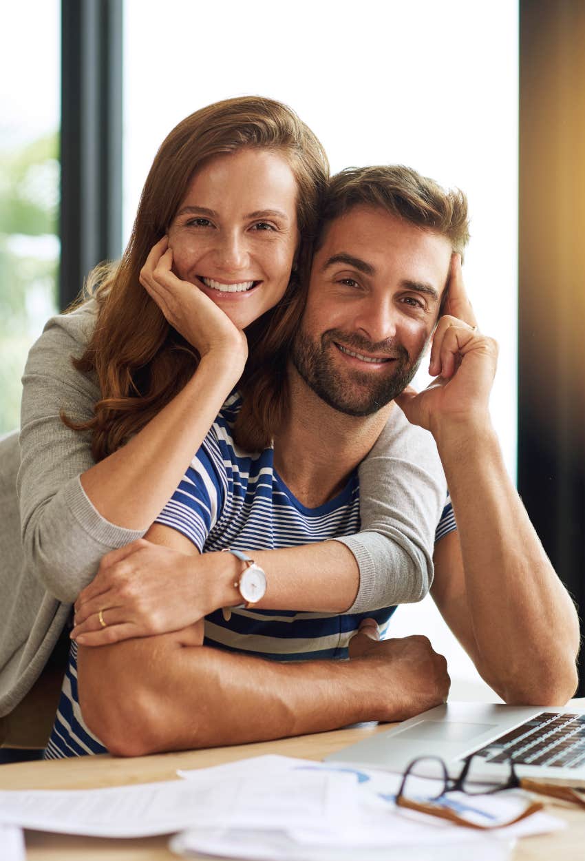 A man laughs at everything going wrong and makes light of the situation.