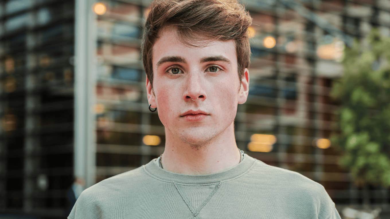 serious young gen z man thinking intently