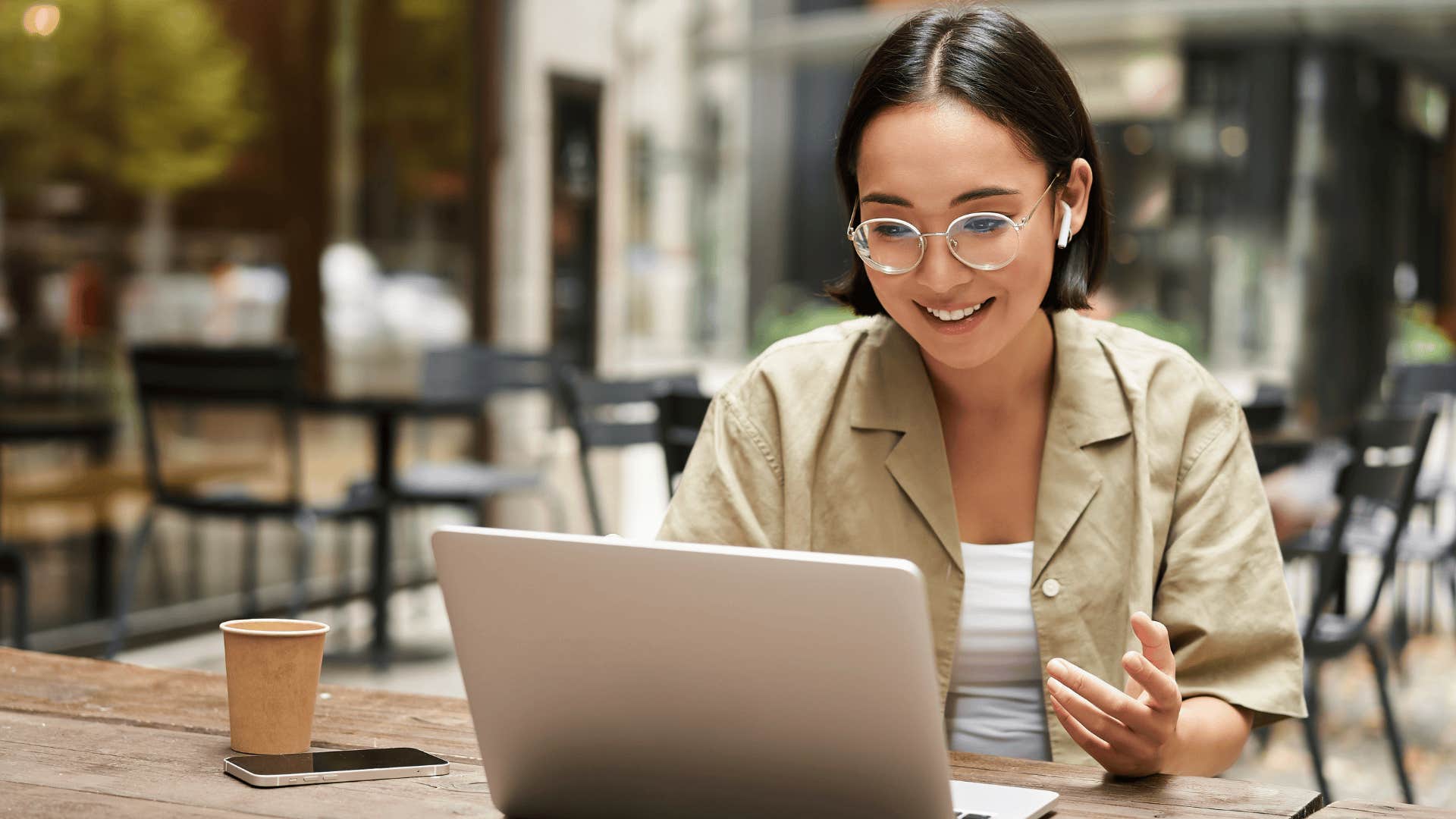 young woman smiling on zoom call