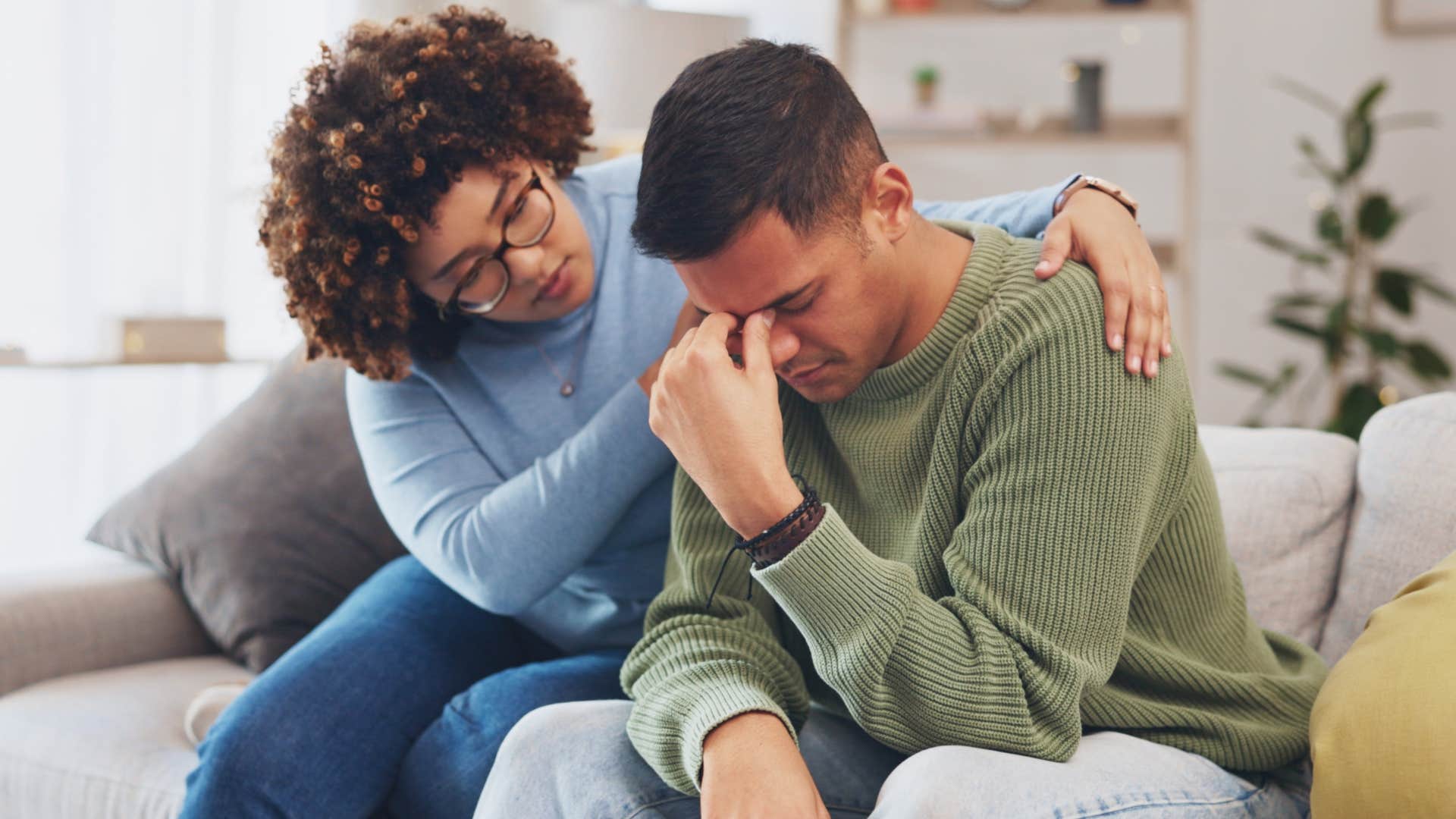 woman comforting man to keep the peace