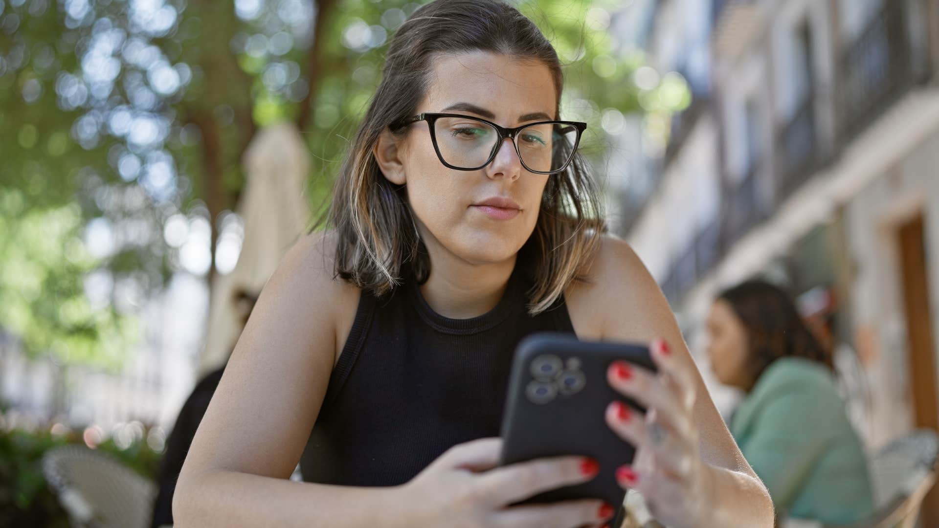 upset woman apologizing via text for lying