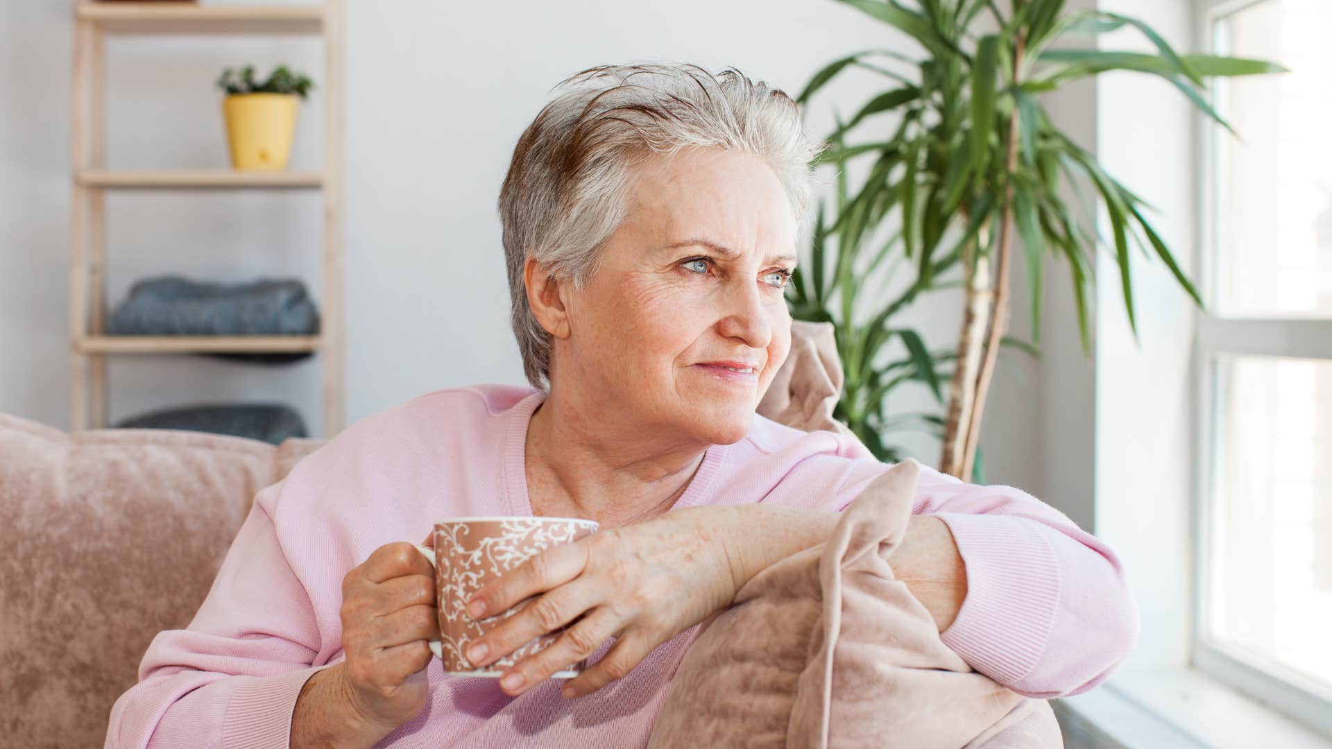 woman who is happy because she doesn't have to socialize