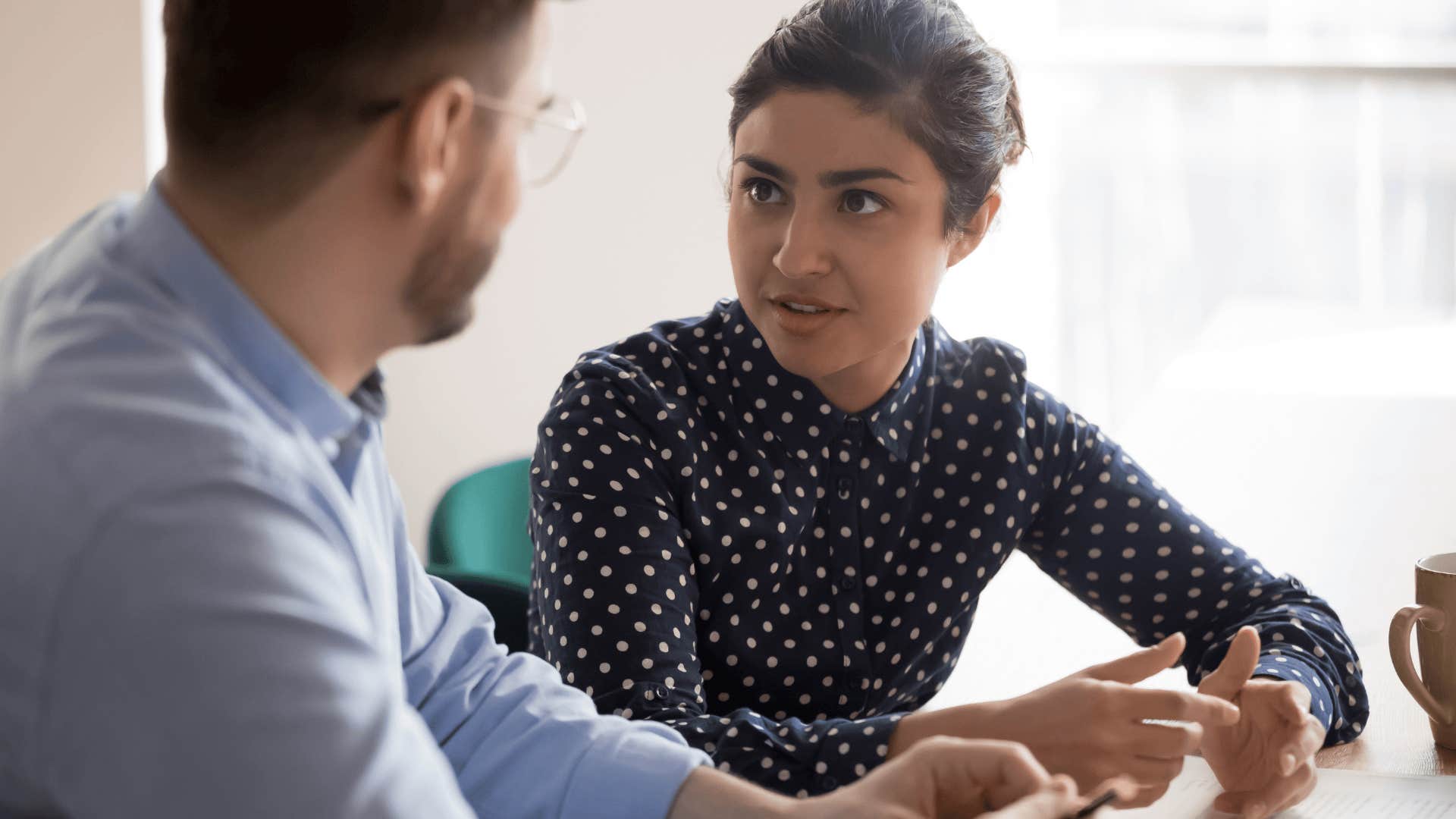 woman having a serious conversation with a man