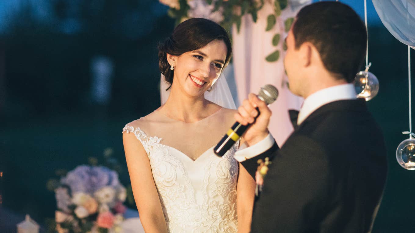 Bride and Groom Announce How Much Money Everyone Gave During Their Wedding Reception bride and groom announcing how much money everyone gave