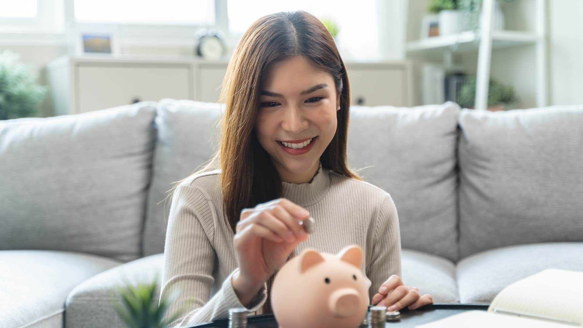 A woman saves what little money she does have and makes do with it.