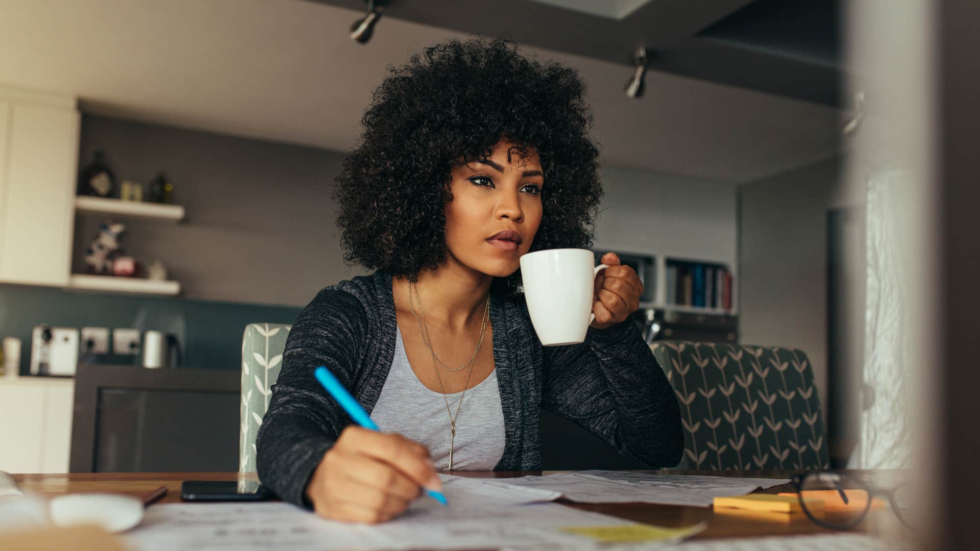 A woman works hard from home but remains humble.