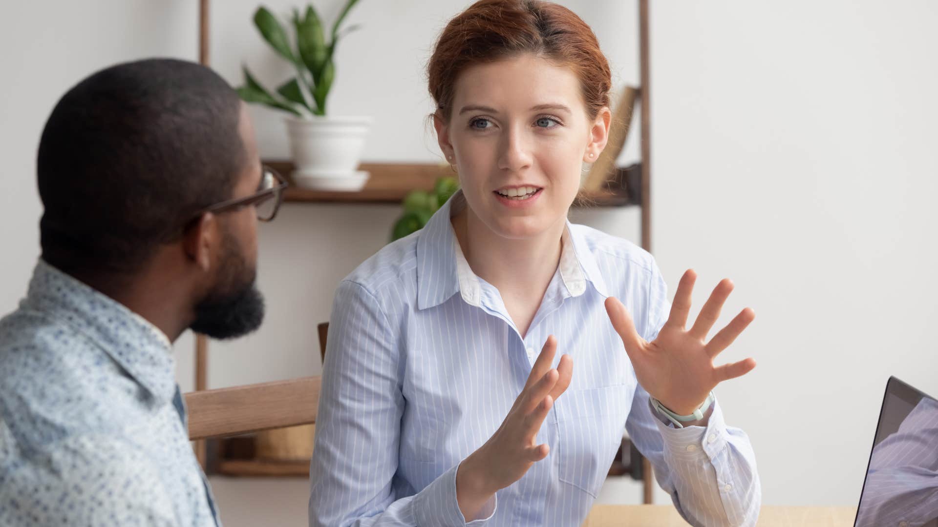 woman telling colleague she noticed he's less engaged at work