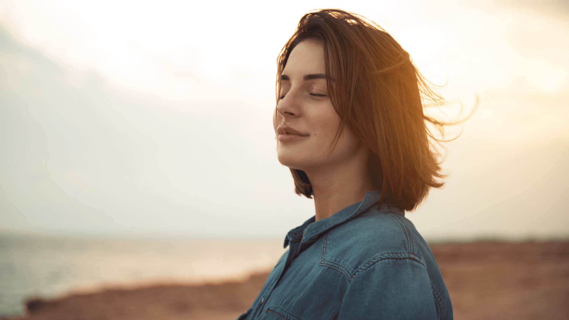 woman with eyes closed trusting intuition