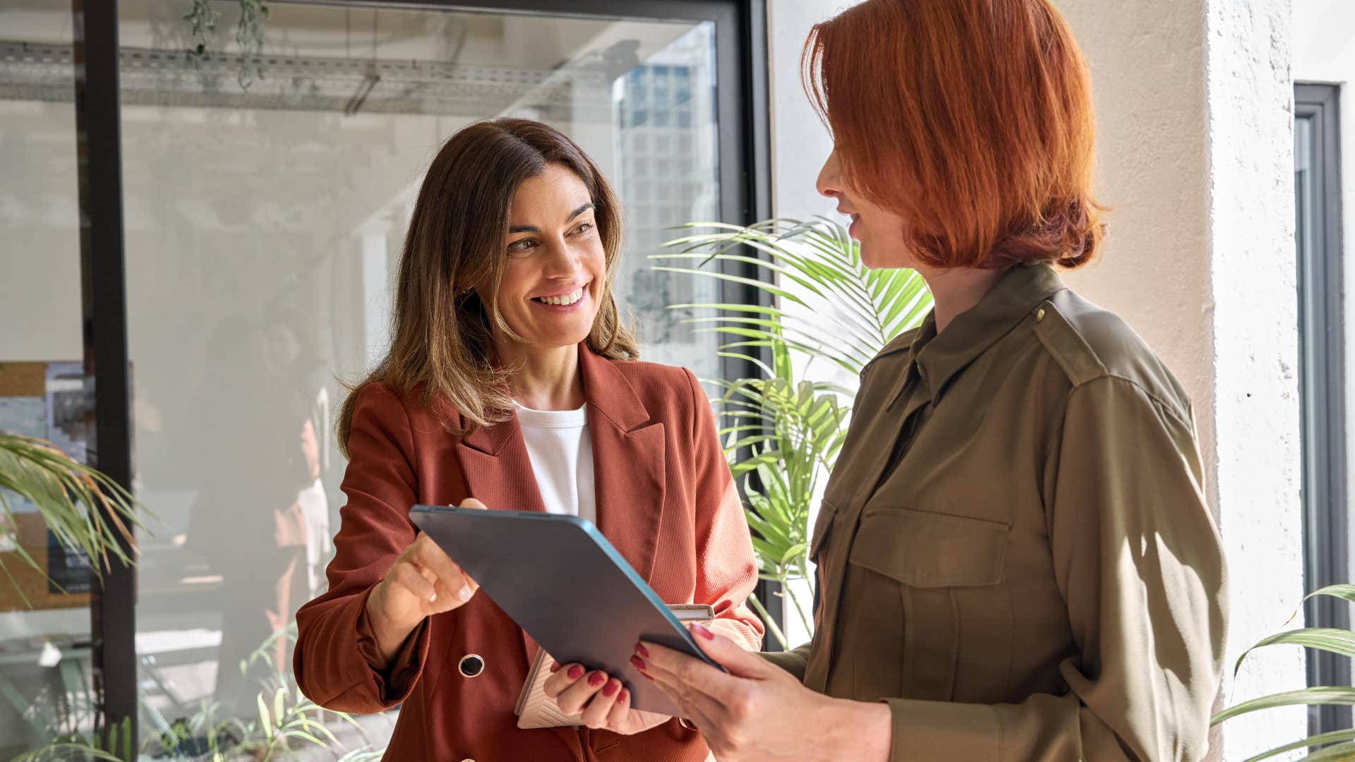 professional woman networking with colleague