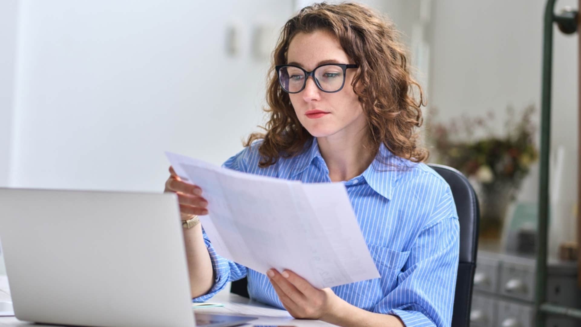 woman setting up automated savings account 